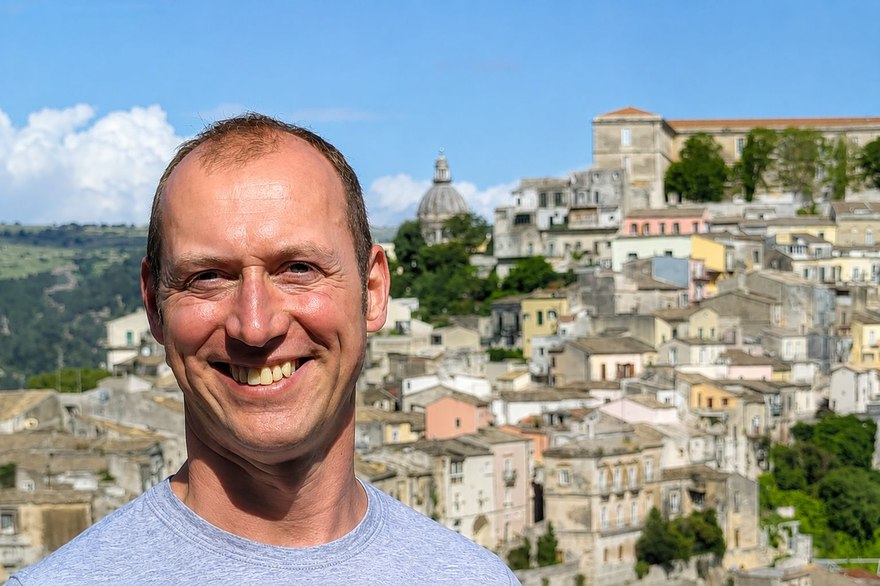 Dom Hebblethwaite in Ragusa Ibla, the cathedral dome on the skyline behind